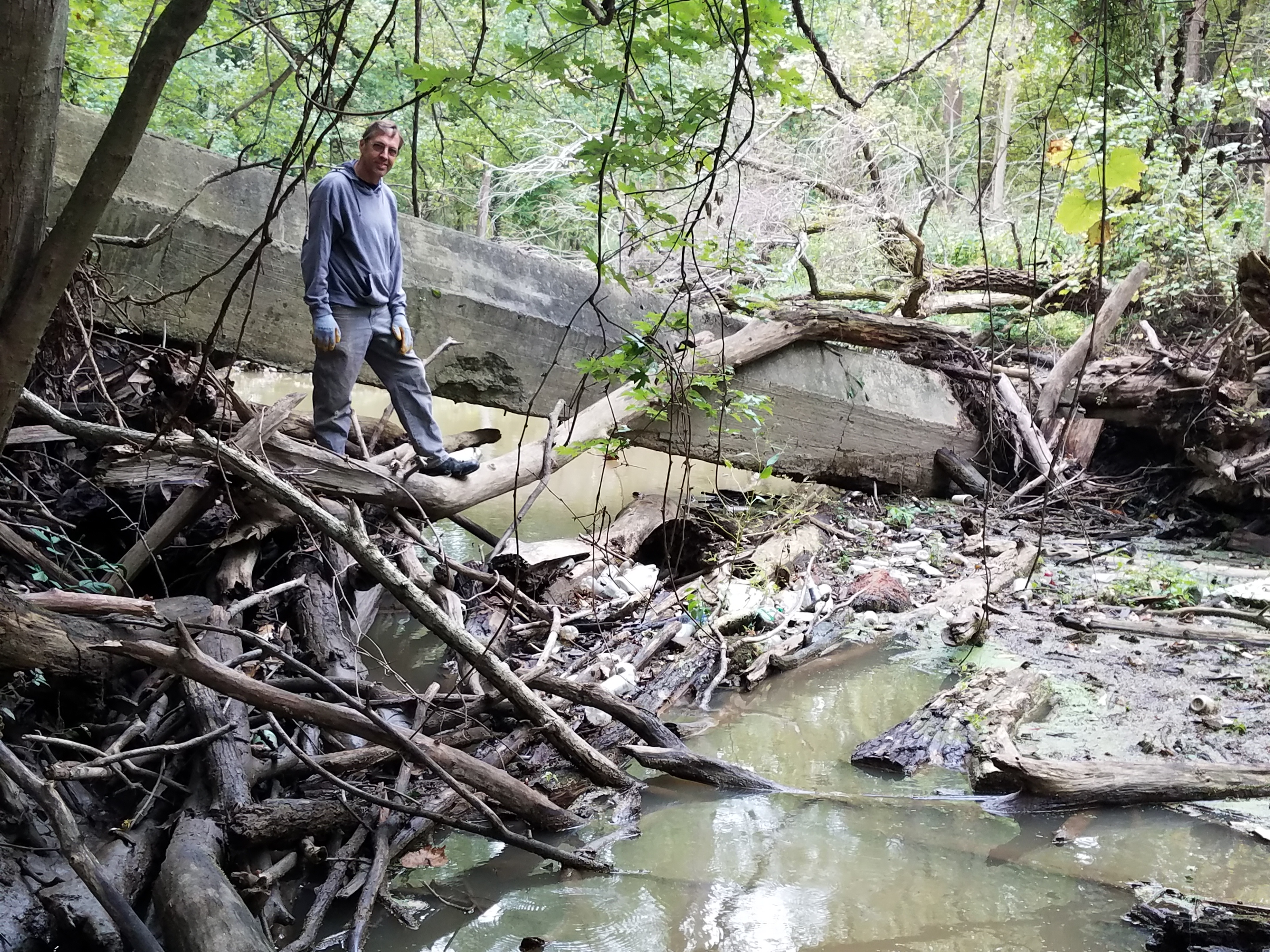 Erik surveys the river debris