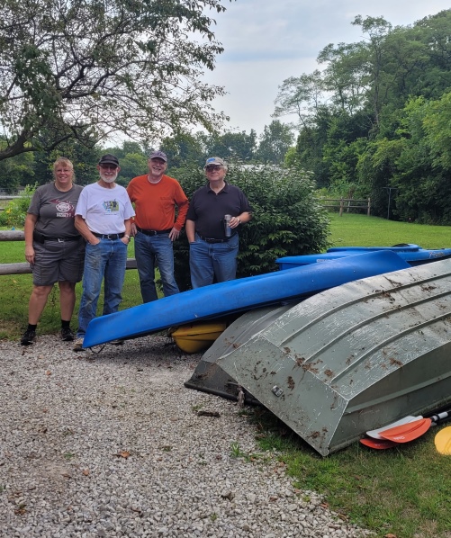 River Cleanup Volunteers and Boats